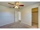 Bright bedroom with ceiling fan and closet at 11339 Gulfstream Blvd, Port Charlotte, FL 33981