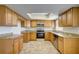 Modern kitchen with granite countertops and stainless steel appliances at 11339 Gulfstream Blvd, Port Charlotte, FL 33981