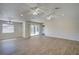 Spacious living area with high ceilings and wood flooring at 11339 Gulfstream Blvd, Port Charlotte, FL 33981