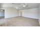 Large living room with vaulted ceilings and wood flooring at 11339 Gulfstream Blvd, Port Charlotte, FL 33981