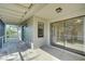 Screened porch with sliding glass doors at 11339 Gulfstream Blvd, Port Charlotte, FL 33981