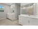 Main bathroom with double vanity and large shower at 12354 54Th E St, Parrish, FL 34219