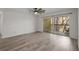 Bedroom with sliding doors to balcony at 14115 Mossy Glen Ln # 201, Tampa, FL 33613