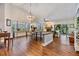 Bright dining area with wood floors and a rustic table at 14631 Village Glen Cir, Tampa, FL 33618