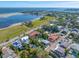 Stunning aerial view of a coastal neighborhood with beach access and diverse homes, showcasing a vibrant community at 1925 Beach Se Dr, St Petersburg, FL 33705