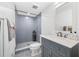Modern bathroom with gray tile shower and vanity at 1925 Beach Se Dr, St Petersburg, FL 33705