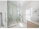 Sleek bathroom with a glass-enclosed shower, modern fixtures, and elegant tile work, offering a spa-like experience at 1925 Beach Se Dr, St Petersburg, FL 33705