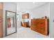 Versatile bonus room with custom cabinetry, wet bar, and marble floors, suitable for a variety of uses at 1925 Beach Se Dr, St Petersburg, FL 33705