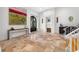 Beautiful entryway featuring tile floors, a fireplace, and abundant natural light at 1925 Beach Se Dr, St Petersburg, FL 33705