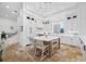 Bright kitchen with a large island, white cabinets, and barstool seating at 1925 Beach Se Dr, St Petersburg, FL 33705
