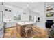 Bright, spacious kitchen featuring a large island, modern appliances, and stylish travertine floors for culinary enthusiasts at 1925 Beach Se Dr, St Petersburg, FL 33705