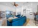Open-concept living room with stylish furniture, water view, and access to the kitchen at 1925 Beach Se Dr, St Petersburg, FL 33705