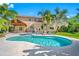 Large freeform pool with pergola and lush landscaping at 1925 Beach Se Dr, St Petersburg, FL 33705