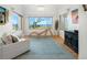 Bright sitting area with water views, comfortable furniture, and play equipment at 1925 Beach Se Dr, St Petersburg, FL 33705