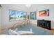 Bright sitting area with water views, comfortable furniture, and play equipment at 1925 Beach Se Dr, St Petersburg, FL 33705