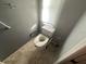 Accessible toilet with grab bars for added safety at 2161 Aqui Esta Dr, Punta Gorda, FL 33950