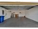 Spacious garage with epoxy floor and overhead storage at 2226 Nottingham Greens Dr # 2226, Sun City Center, FL 33573