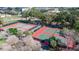 Two well-maintained tennis courts at 304 Knottwood Ct, Sun City Center, FL 33573