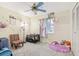 bedroom with crib, toys, and plenty of floor space at 3407 King George Ln, Seffner, FL 33584