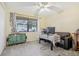 Bright bedroom with window, foosball table, and a desk at 3407 King George Ln, Seffner, FL 33584