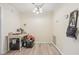 Simple dining area with light wood flooring and a small table at 3407 King George Ln, Seffner, FL 33584
