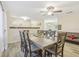 Spacious dining area with a large wooden table and seating for eight at 3407 King George Ln, Seffner, FL 33584