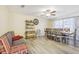 Dining room with wood table, chairs, and a comfortable couch at 3407 King George Ln, Seffner, FL 33584