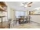 Bright dining room featuring a large table and six chairs at 3407 King George Ln, Seffner, FL 33584