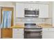 Kitchen features stainless steel appliances and wood countertops at 3407 King George Ln, Seffner, FL 33584