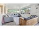 Relaxing sunroom featuring comfortable seating and ample natural light at 3407 King George Ln, Seffner, FL 33584