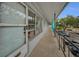 Exterior walkway leading to a unit's entrance, providing easy access and a welcoming ambiance at 4152 55 N Way # 1030, Kenneth City, FL 33709