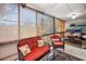 Inviting sunroom with comfortable seating, natural light, and neutral tones at 4152 55 N Way # 1030, Kenneth City, FL 33709