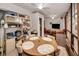 Open sunroom showing casual dining and living areas at 4152 55 N Way # 1030, Kenneth City, FL 33709