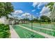 Exterior wide angle of the multiple shuffleboard courts at 4152 55 N Way # 1030, Kenneth City, FL 33709