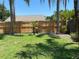 Large, well-maintained backyard with wooden fence provides privacy for outdoor enjoyment at 5105 Garden Vale Ave, Tampa, FL 33624