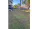 Large backyard with grassy area and trees at 5105 Garden Vale Ave, Tampa, FL 33624