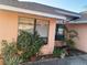 Front view of house with landscaping at 5105 Garden Vale Ave, Tampa, FL 33624