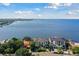 Aerial view of waterfront property showcasing expansive bay views and a large home at 5120 W Longfellow Ave, Tampa, FL 33629