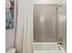 Clean bathroom with shower and mosaic tile at 5120 W Longfellow Ave, Tampa, FL 33629