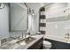 Clean bathroom with a tub and shower at 5120 W Longfellow Ave, Tampa, FL 33629
