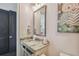 Small bathroom with a vanity and toilet at 5120 W Longfellow Ave, Tampa, FL 33629