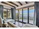 Relaxing bedroom with water views and access to a private balcony at 5120 W Longfellow Ave, Tampa, FL 33629