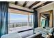 Bedroom with water views and access to balcony at 5120 W Longfellow Ave, Tampa, FL 33629