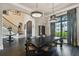 Bright and spacious entryway with a grand staircase and high ceilings at 5120 W Longfellow Ave, Tampa, FL 33629