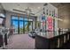 Game room with bar, comfy seating, and water views at 5120 W Longfellow Ave, Tampa, FL 33629