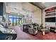 Spacious game room with a bar, comfortable seating, and entertainment at 5120 W Longfellow Ave, Tampa, FL 33629
