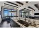 Gourmet kitchen with expansive water views, large island, and high-end appliances at 5120 W Longfellow Ave, Tampa, FL 33629