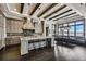 Gourmet kitchen with island, granite counters, and stainless steel appliances at 5120 W Longfellow Ave, Tampa, FL 33629