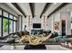 Spacious living area with high ceilings, exposed beams, and water views at 5120 W Longfellow Ave, Tampa, FL 33629