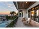 Spacious covered patio with comfortable seating and breathtaking water views at 5120 W Longfellow Ave, Tampa, FL 33629
